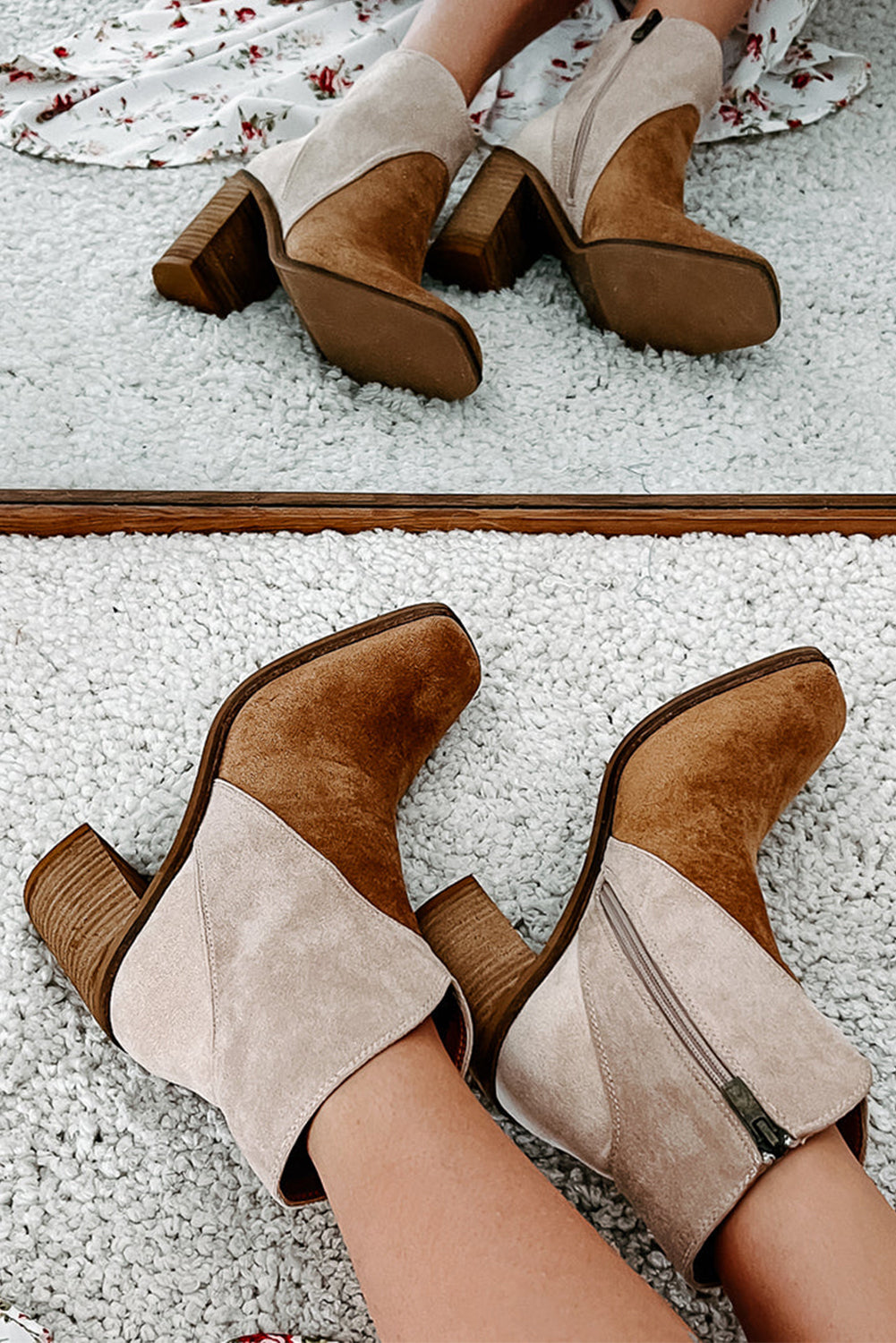 Pair of brown and beige suede ankle boots on a textured surface